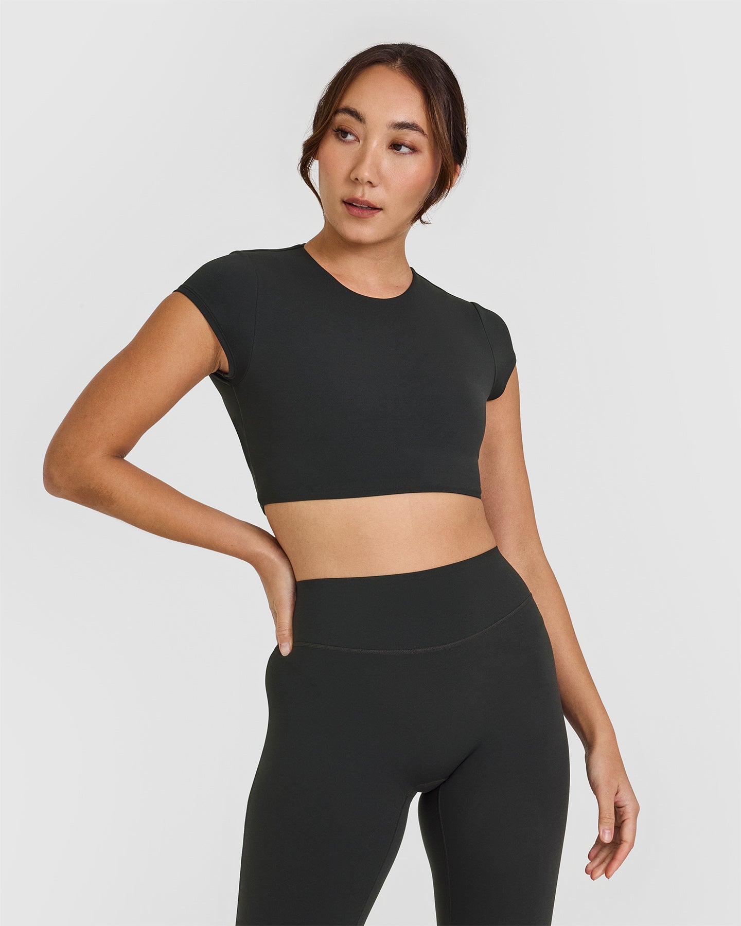 SoftMotionâ„¢ Short Sleeve Crop Top with White Logo | Soft Black