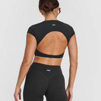 SoftMotionâ„¢ Short Sleeve Crop Top with White Logo | Soft Black