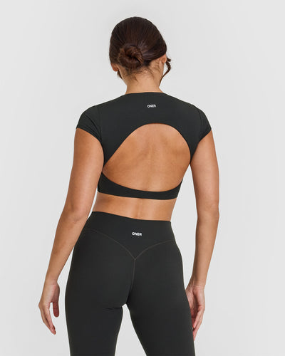 SoftMotionâ„¢ Short Sleeve Crop Top with White Logo | Soft Black