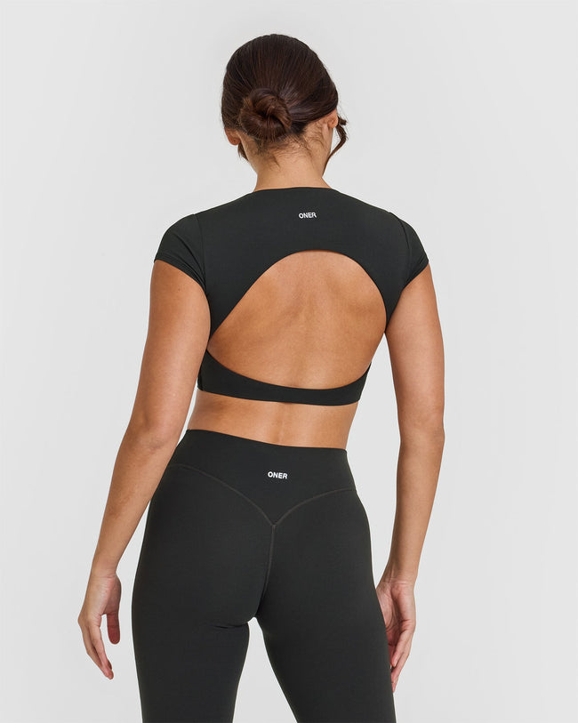 SoftMotionâ„¢ Short Sleeve Crop Top with White Logo | Soft Black