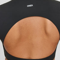 SoftMotionâ„¢ Short Sleeve Crop Top with White Logo | Soft Black