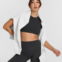 SoftMotionâ„¢ Short Sleeve Crop Top with White Logo | Soft Black