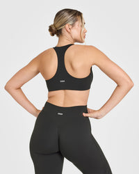 SoftMotionâ„¢ Bralette with White Logo | Soft Black