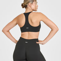 SoftMotionâ„¢ Bralette with White Logo | Soft Black