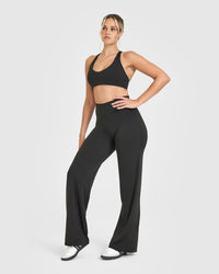 SoftMotionâ„¢ Bralette with White Logo | Soft Black