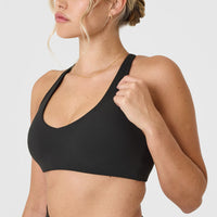 SoftMotionâ„¢ Bralette with White Logo | Soft Black