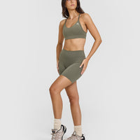 SoftMotionâ„¢ Cycling Shorts 8" with White Logo | Alpine Green