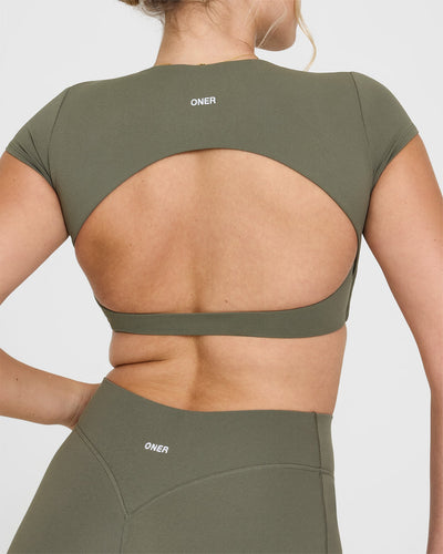 SoftMotionâ„¢ Short Sleeve Crop Top with White Logo | Alpine Green