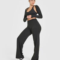 SoftMotionâ„¢ Long Sleeve Shrug with White Logo | Soft Black