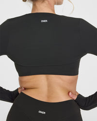 SoftMotionâ„¢ Long Sleeve Shrug with White Logo | Soft Black