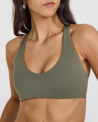 SoftMotionâ„¢ Bralette with White Logo | Alpine Green