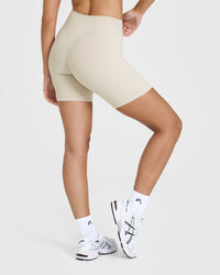 SoftMotionâ„¢ Cycling Shorts 8" with White Logo | Sand