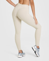 SoftMotionâ„¢ Leggings with White Logo | Sand