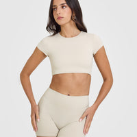 SoftMotionâ„¢ Short Sleeve Crop Top with White Logo | Sand