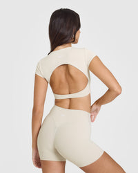 SoftMotionâ„¢ Short Sleeve Crop Top with White Logo | Sand