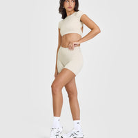 SoftMotionâ„¢ Short Sleeve Crop Top with White Logo | Sand