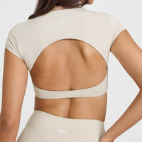 SoftMotionâ„¢ Short Sleeve Crop Top with White Logo | Sand