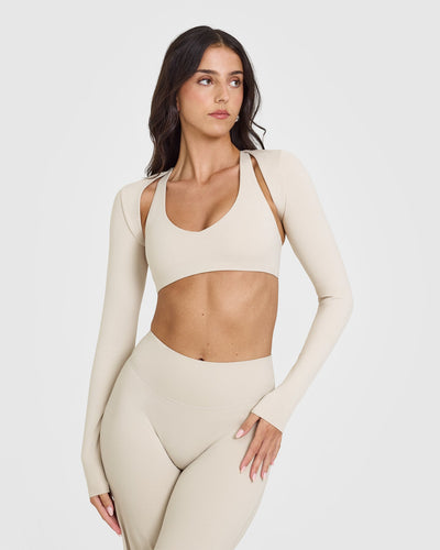 SoftMotionâ„¢ Long Sleeve Shrug with White Logo | Sand