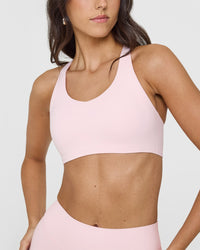 SoftMotionâ„¢ Sports Bra with White Logo | Ballet Pink