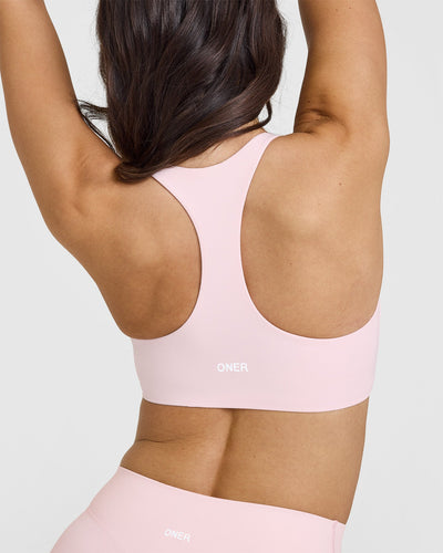 SoftMotionâ„¢ Sports Bra with White Logo | Ballet Pink