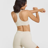SoftMotionâ„¢ Sports Bra with White Logo | Sand