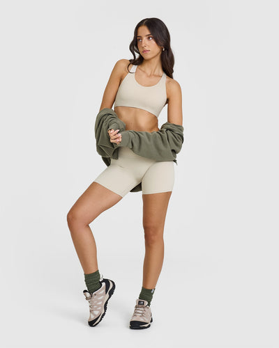 SoftMotionâ„¢ Sports Bra with White Logo | Sand