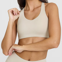 SoftMotionâ„¢ Sports Bra with White Logo | Sand
