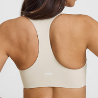 SoftMotionâ„¢ Sports Bra with White Logo | Sand