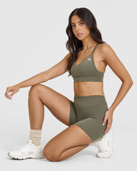 SoftMotionâ„¢ Shorts 6" with White Logo | Alpine Green