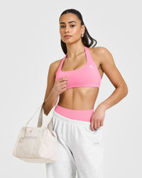 EasyLiftâ„¢ Halter Bralette with White Logo | Peony Pink