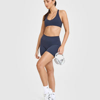 SoftMotionâ„¢ Bralette with White Logo | True Blue