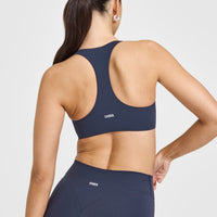 SoftMotionâ„¢ Bralette with White Logo | True Blue