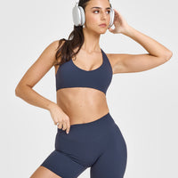 SoftMotionâ„¢ Bralette with White Logo | True Blue