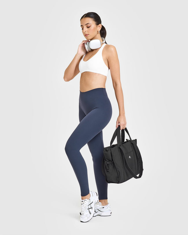 SoftMotionâ„¢ Leggings with White Logo | True Blue