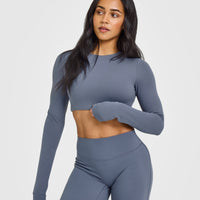 SoftMotionâ„¢ Long Sleeve Crop Top with White Logo | Granite Blue