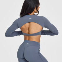 SoftMotionâ„¢ Long Sleeve Crop Top with White Logo | Granite Blue