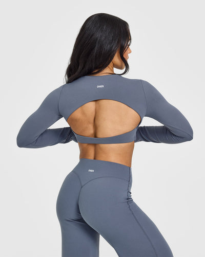 SoftMotionâ„¢ Long Sleeve Crop Top with White Logo | Granite Blue