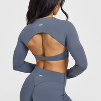 SoftMotionâ„¢ Long Sleeve Crop Top with White Logo | Granite Blue
