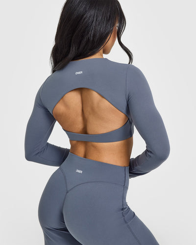 SoftMotionâ„¢ Long Sleeve Crop Top with White Logo | Granite Blue