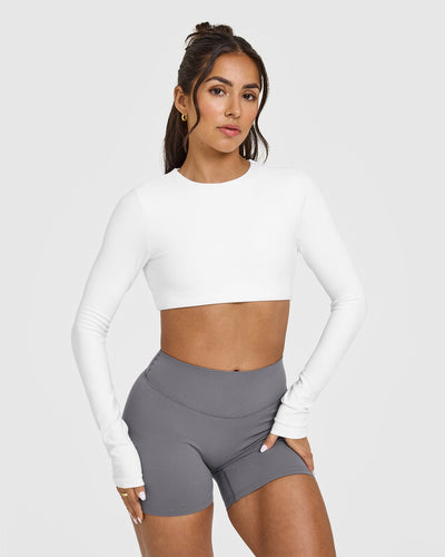 SoftMotionâ„¢ Long Sleeve Crop Top with White Logo | White