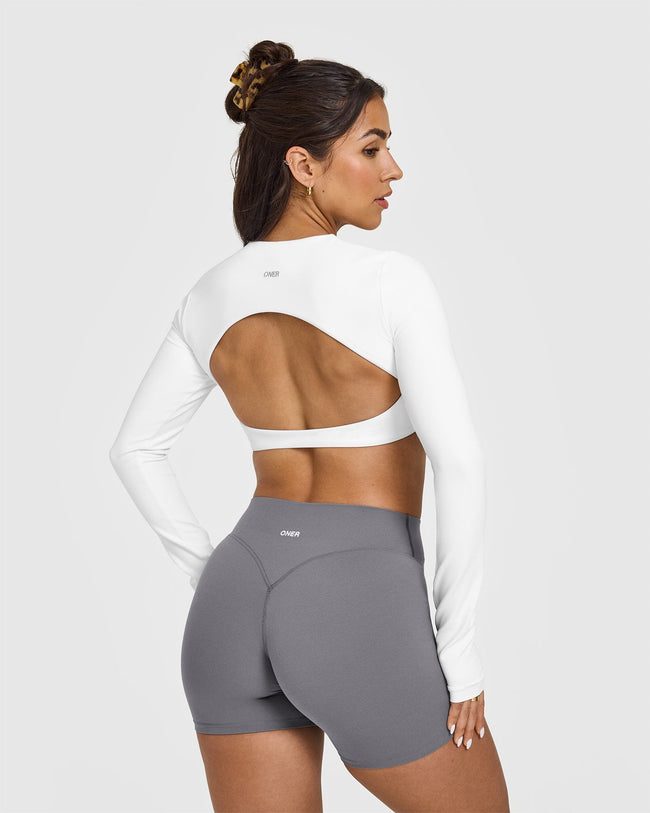 SoftMotionâ„¢ Long Sleeve Crop Top with White Logo | White