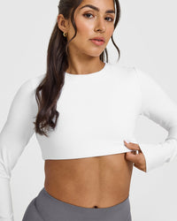 SoftMotionâ„¢ Long Sleeve Crop Top with White Logo | White