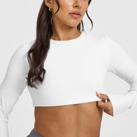 SoftMotionâ„¢ Long Sleeve Crop Top with White Logo | White
