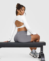 SoftMotionâ„¢ Long Sleeve Crop Top with White Logo | White