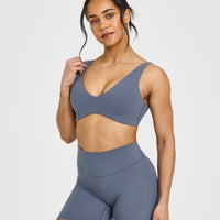 SoftMotionâ„¢ Scoop Back Bralette with White Logo | Granite Blue
