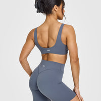 SoftMotionâ„¢ Scoop Back Bralette with White Logo | Granite Blue