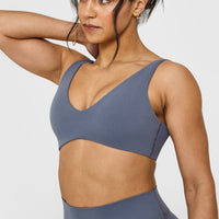SoftMotionâ„¢ Scoop Back Bralette with White Logo | Granite Blue