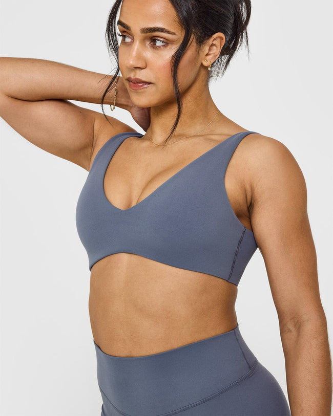 SoftMotionâ„¢ Scoop Back Bralette with White Logo | Granite Blue