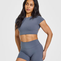 SoftMotionâ„¢ Short Sleeve Crop Top with White Logo | Granite Blue
