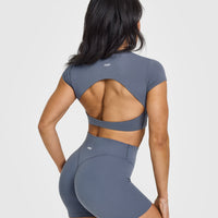 SoftMotionâ„¢ Short Sleeve Crop Top with White Logo | Granite Blue